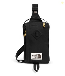 The North Face Berkeley Field Bag | Water Repellent Finish, Vintage Style Travel Essential, Sling Holds Water Bottles, Phones & Keys, TNF Black/Mineral Gold-NPF, One Size